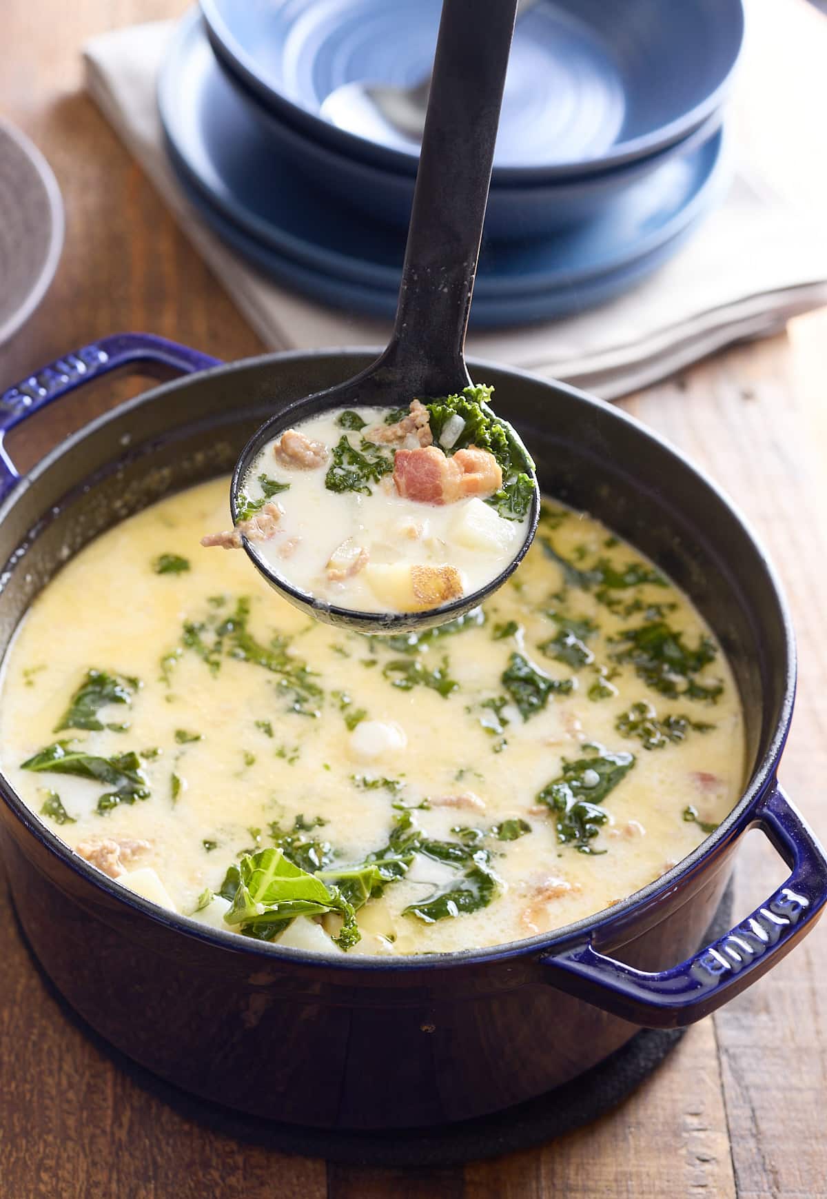 spoon holding up soup