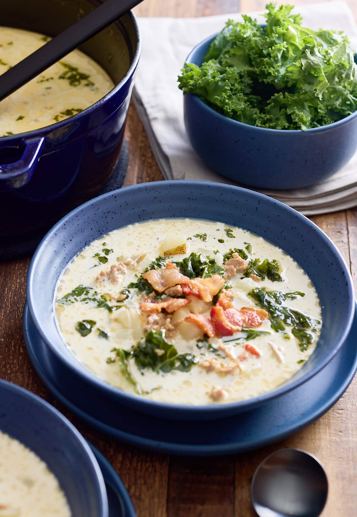 Filled bowl of zuppa toscana soup.