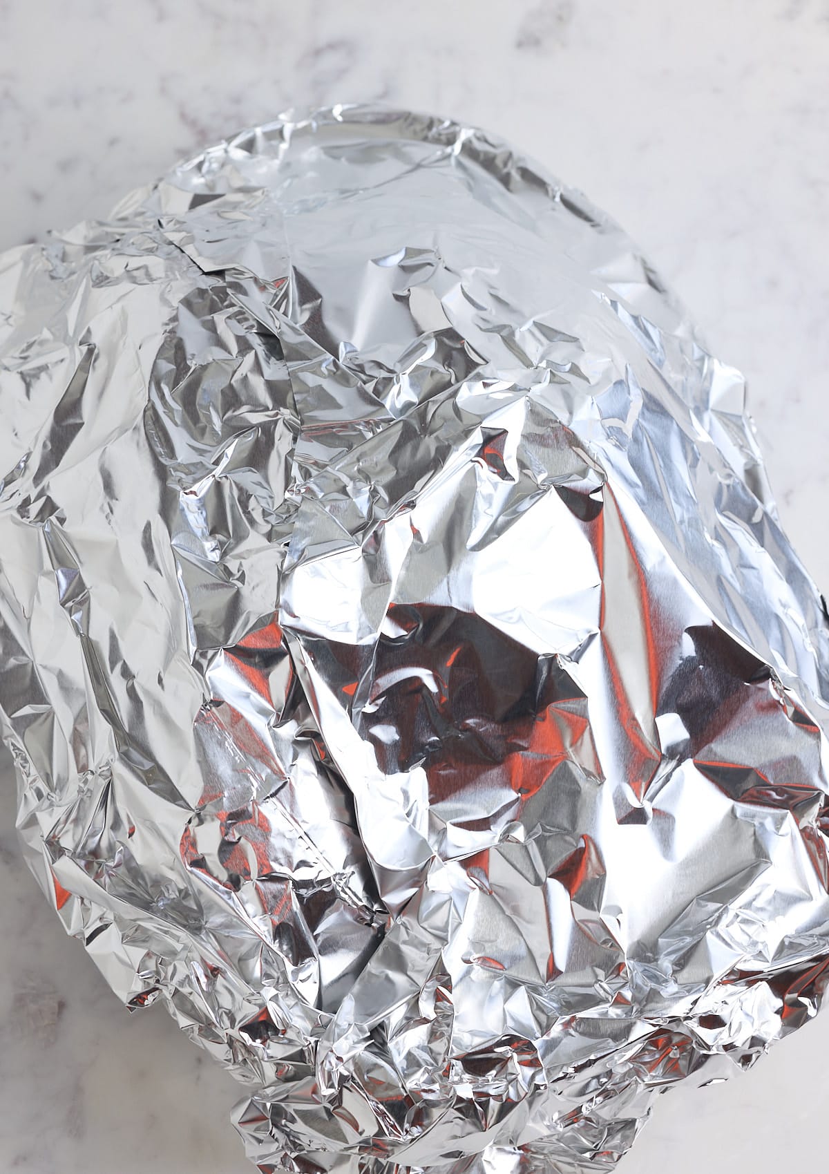 The dish is covered in foil.