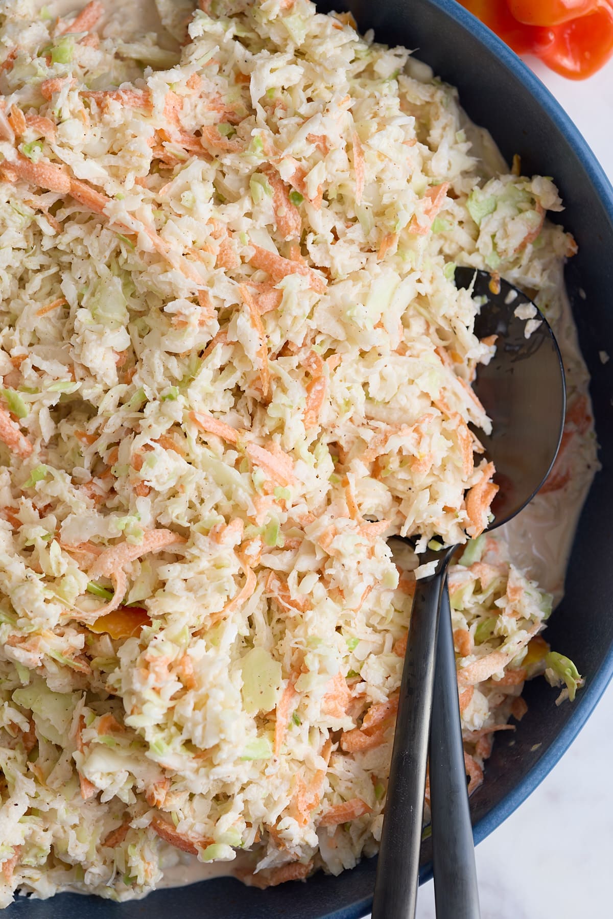 Jamaican coleslaw all mixed together with the dressing.