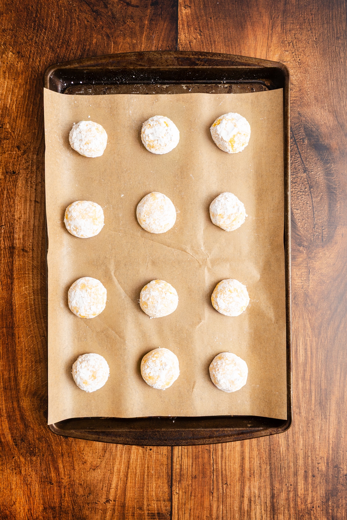 Crinkle cookies on baking sheet before baking