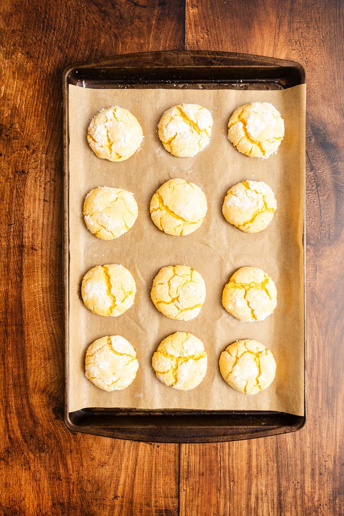 Lemon Crinkle Cookies on baking sheet after baking