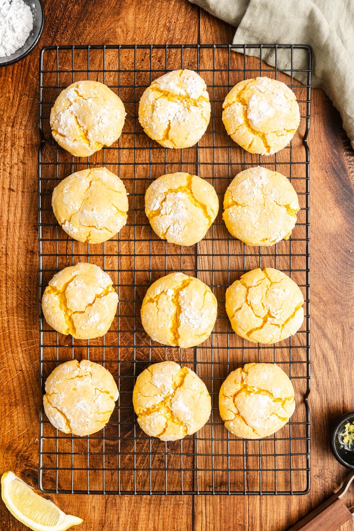 Lemon crinkle cookies on the wire rack.