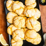lemon crinkle cookies on a baking sheet.