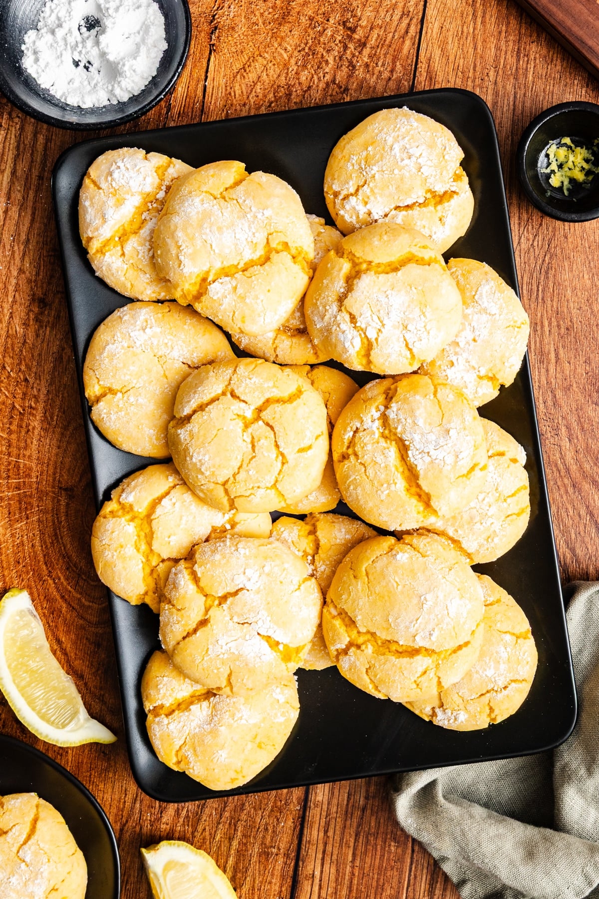 lemon crinkle cookies on a baking sheet.