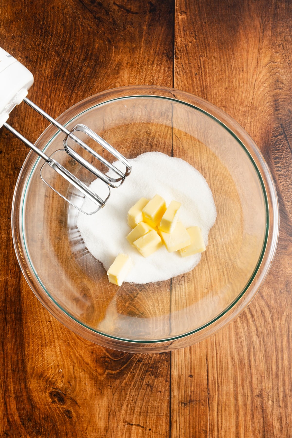 Lemon crinkle cookie mixture being mixed together