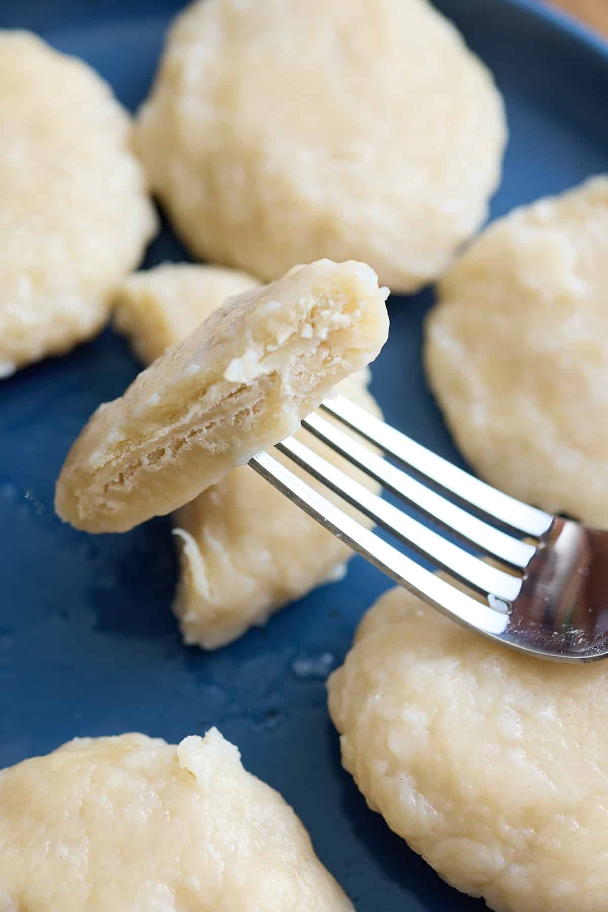 boiled dumplings with 1 dumpling cut in half