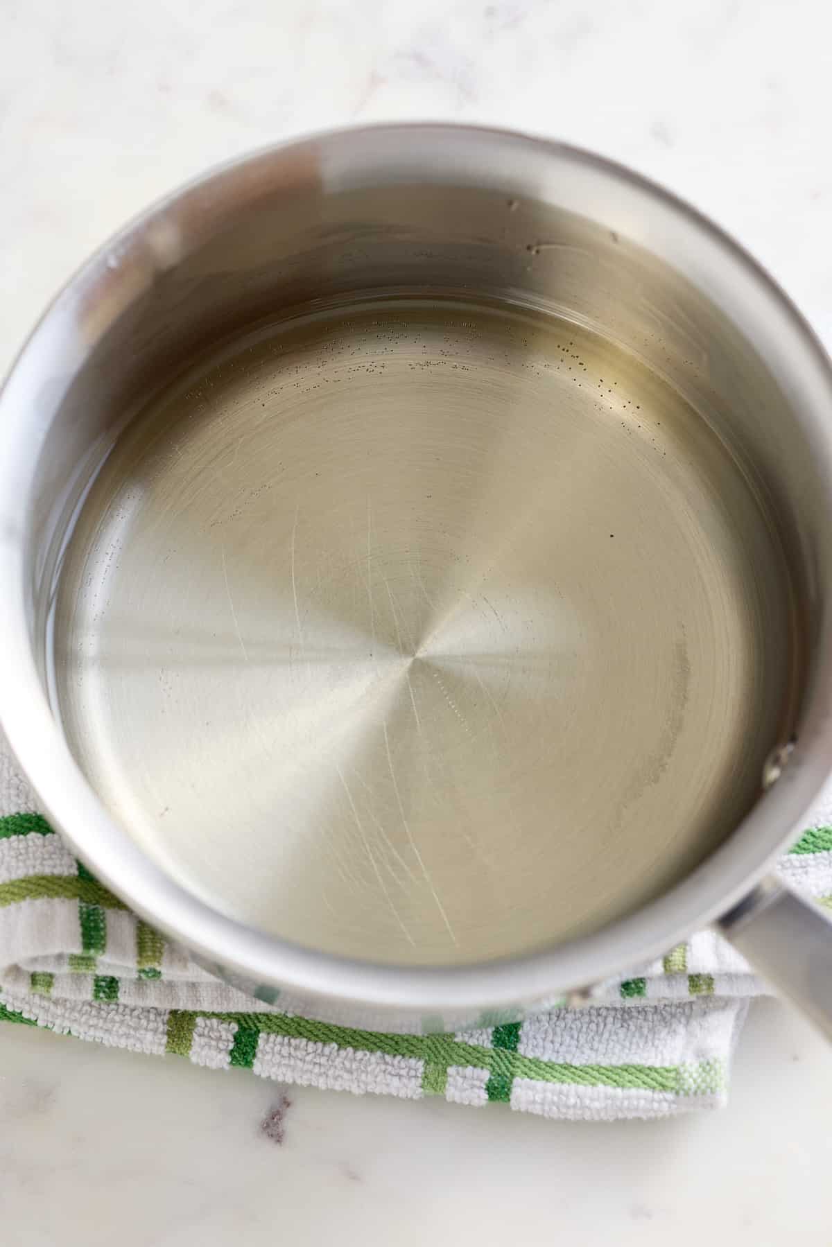 saucepan filled with simple syrup