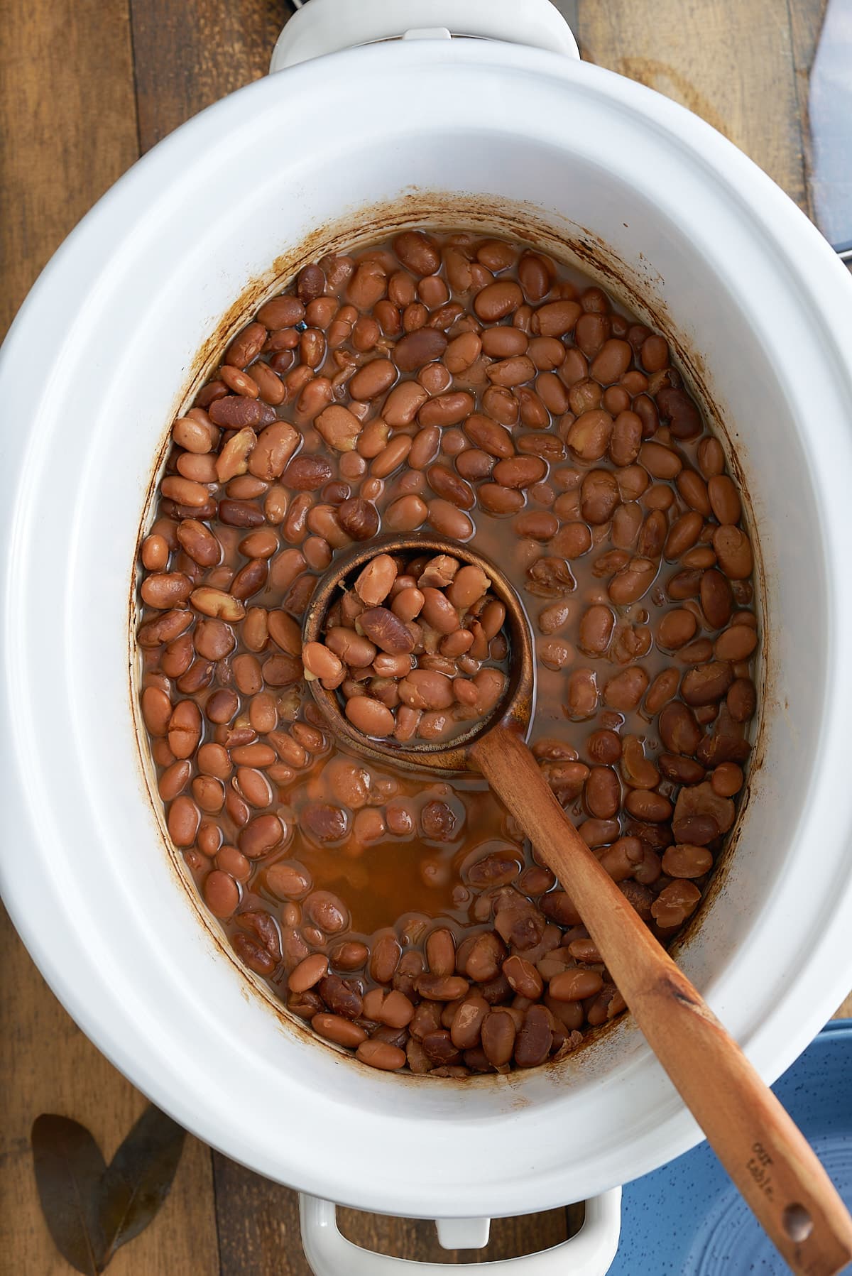 Slow cooker pinto beans cooked in the crock pot.