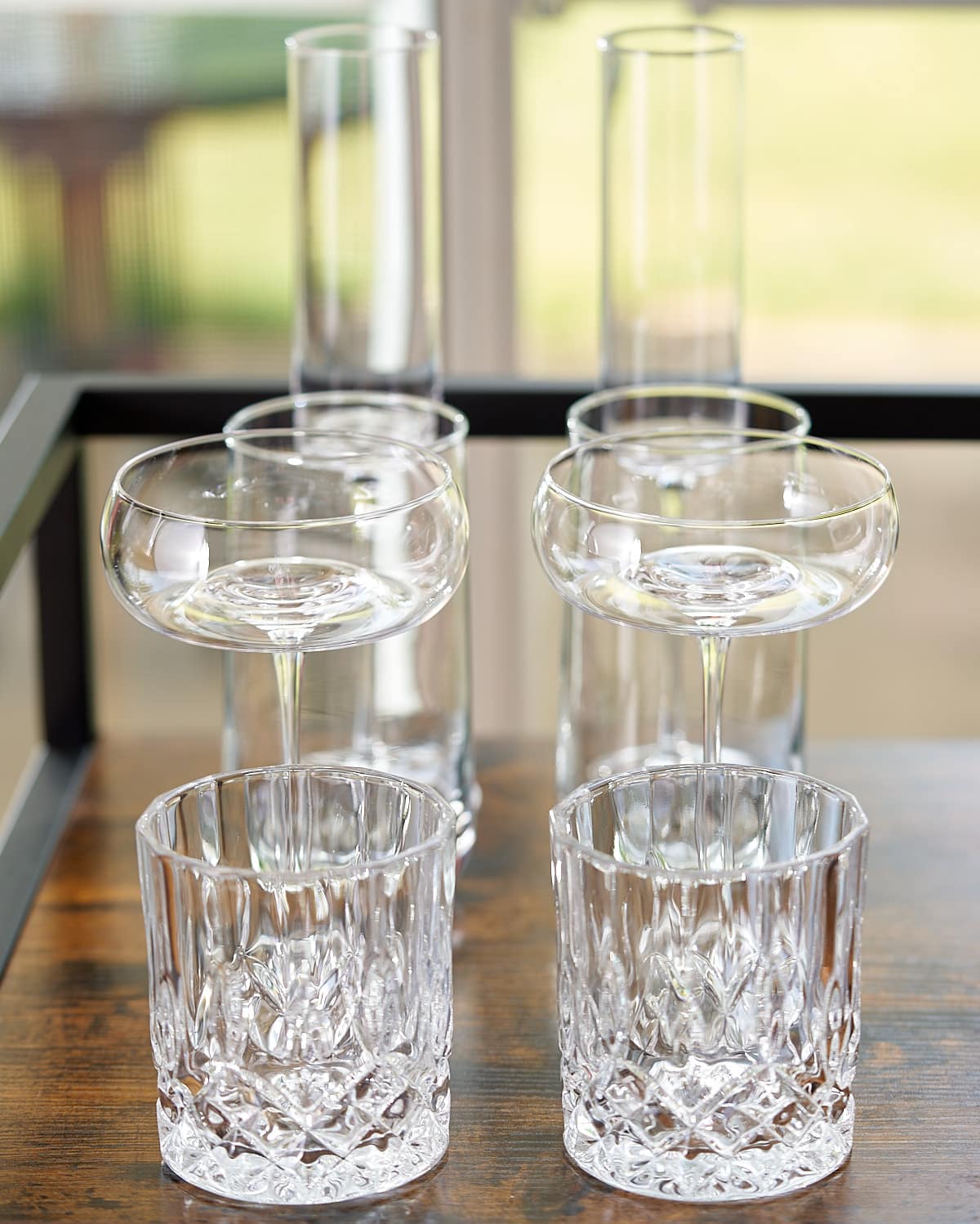glasses and glasware on bar cart for home bar essentials