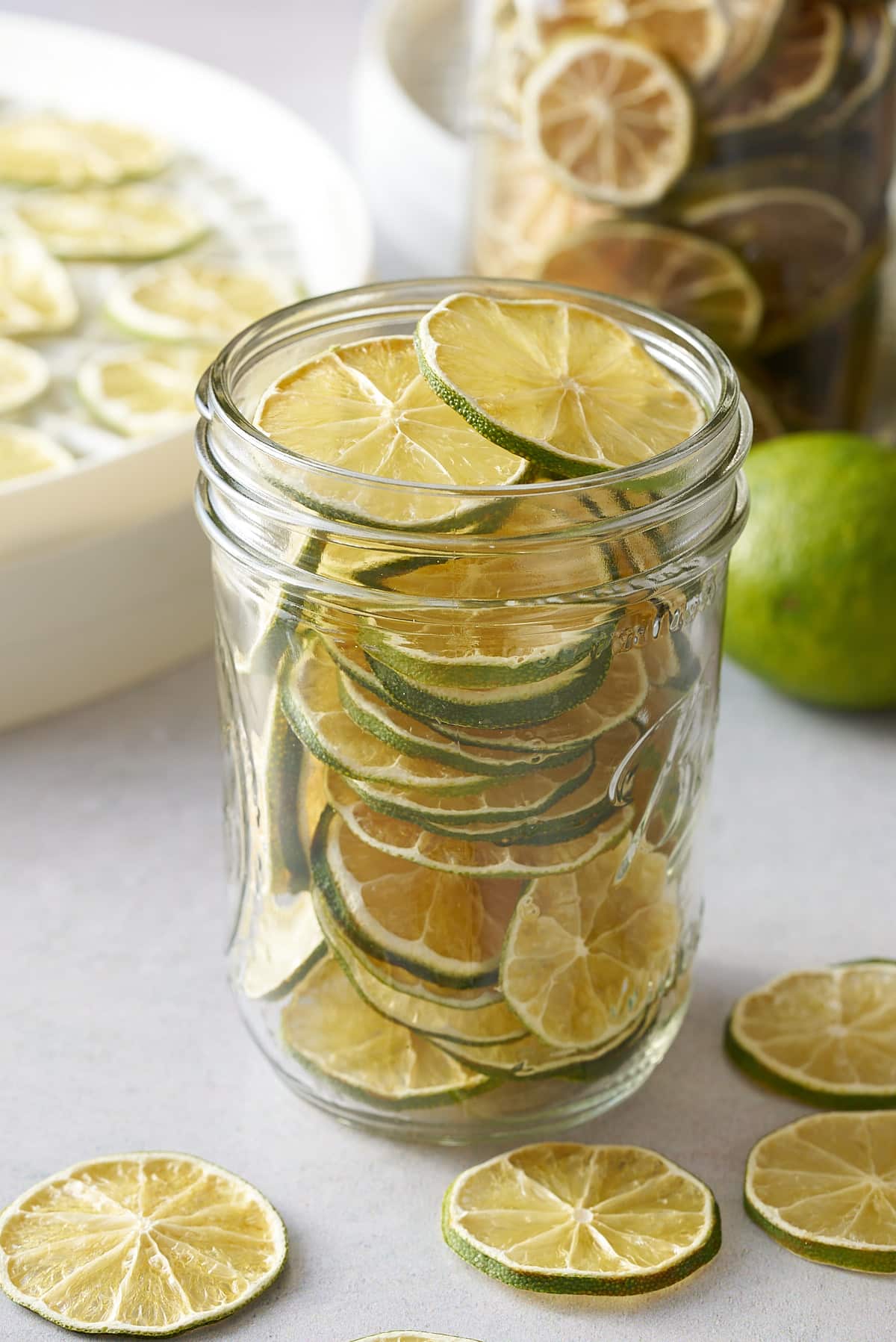 dehydrated limes in glass container