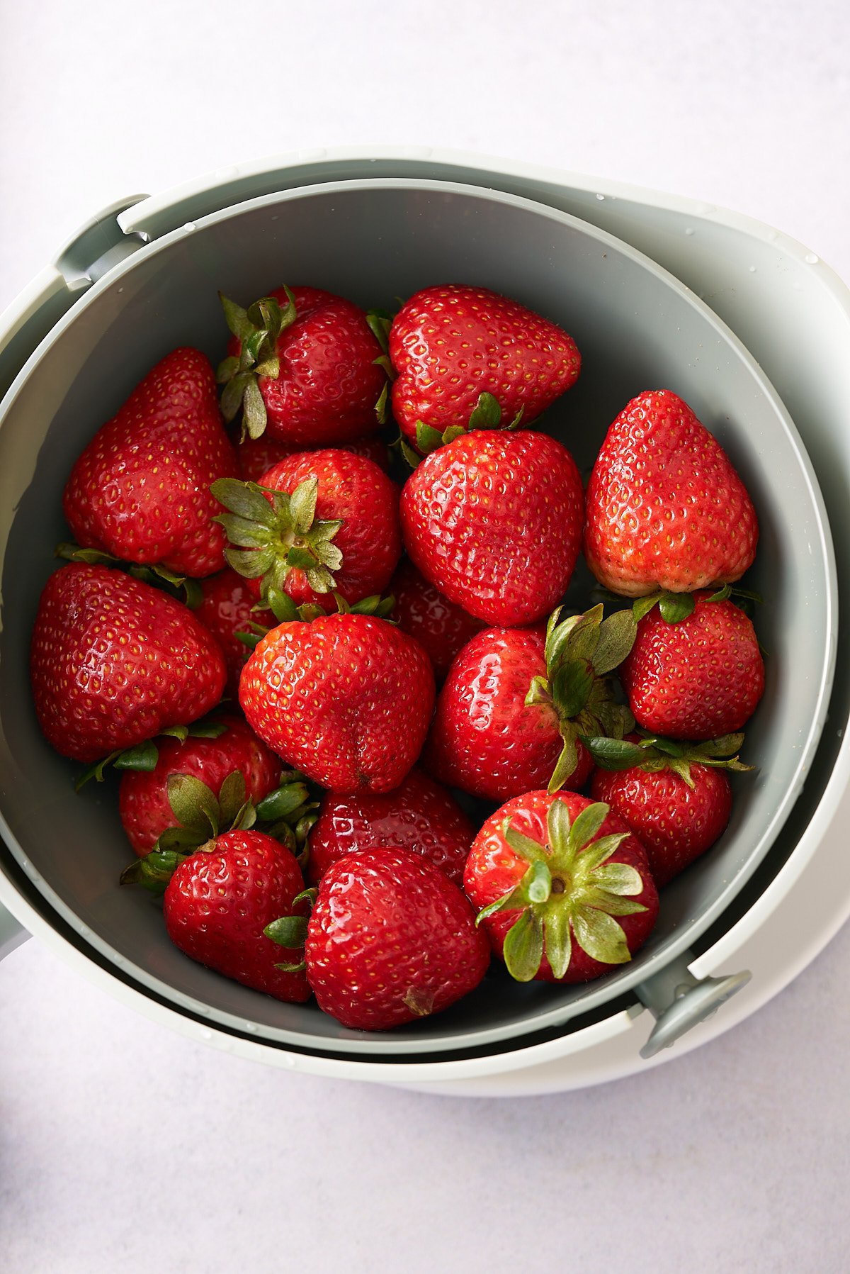 fresh strawberries in colander