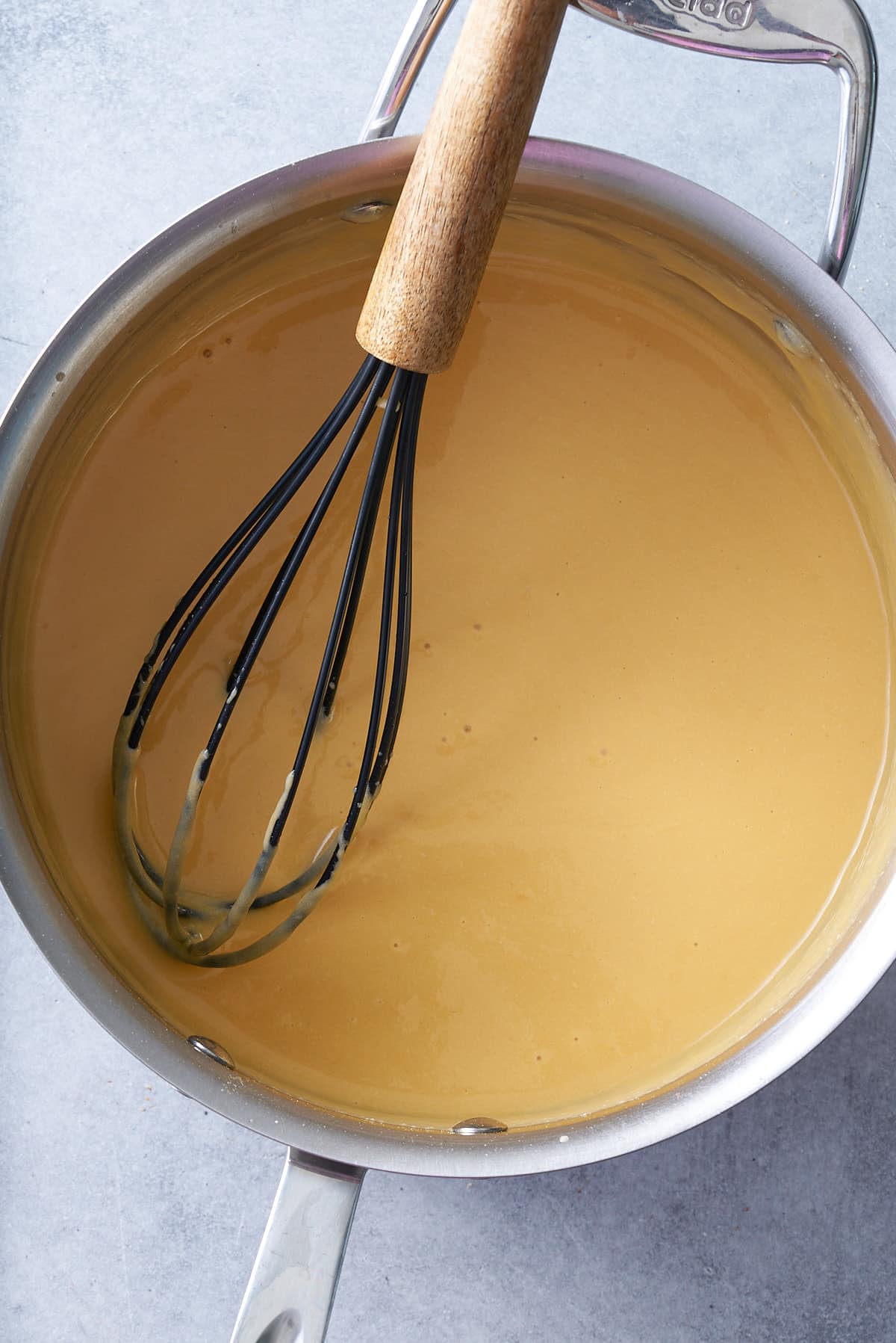 cheese whisked into pan for dip