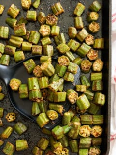 A baking sheet with roasted okra.