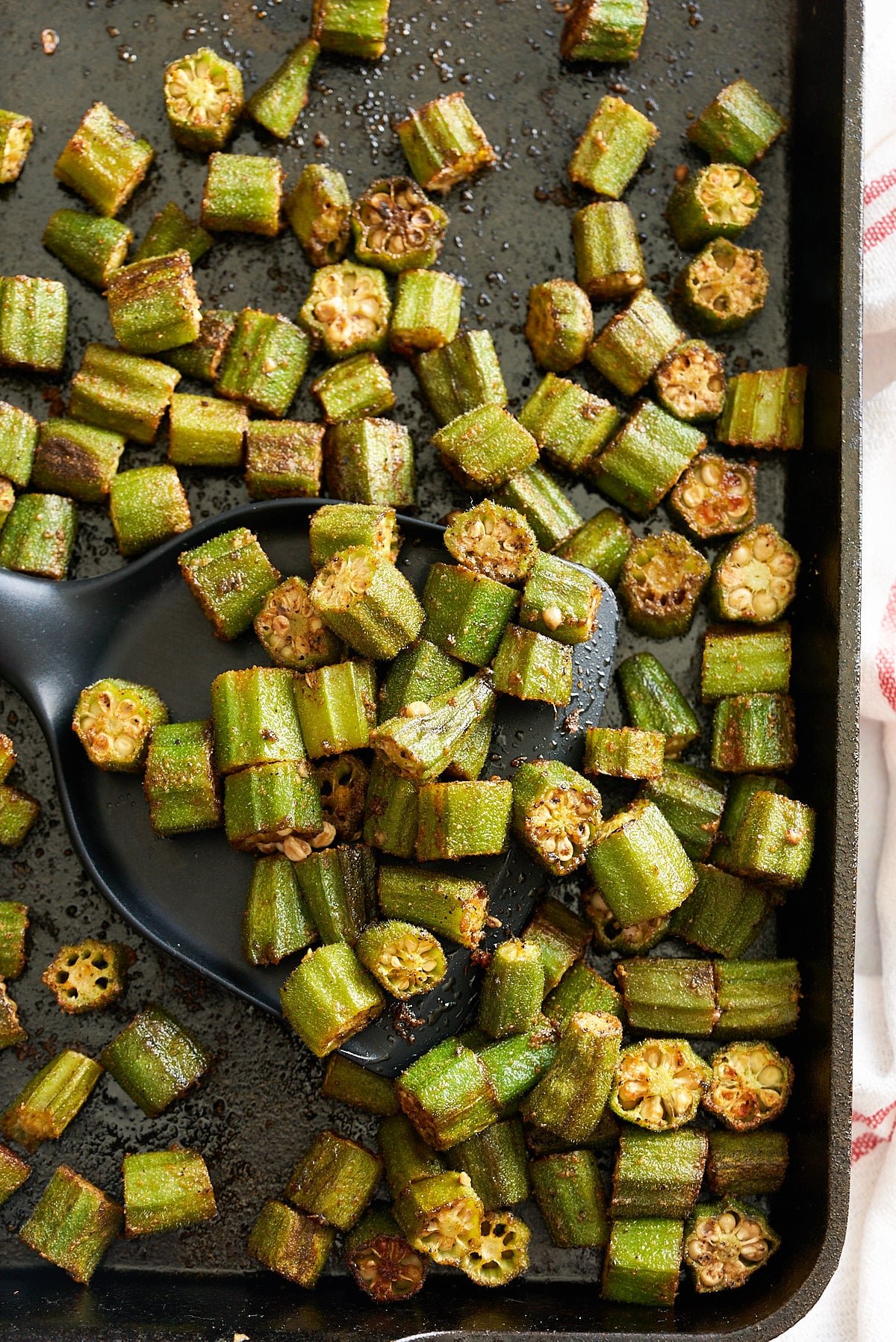 A baking sheet with roasted okra.