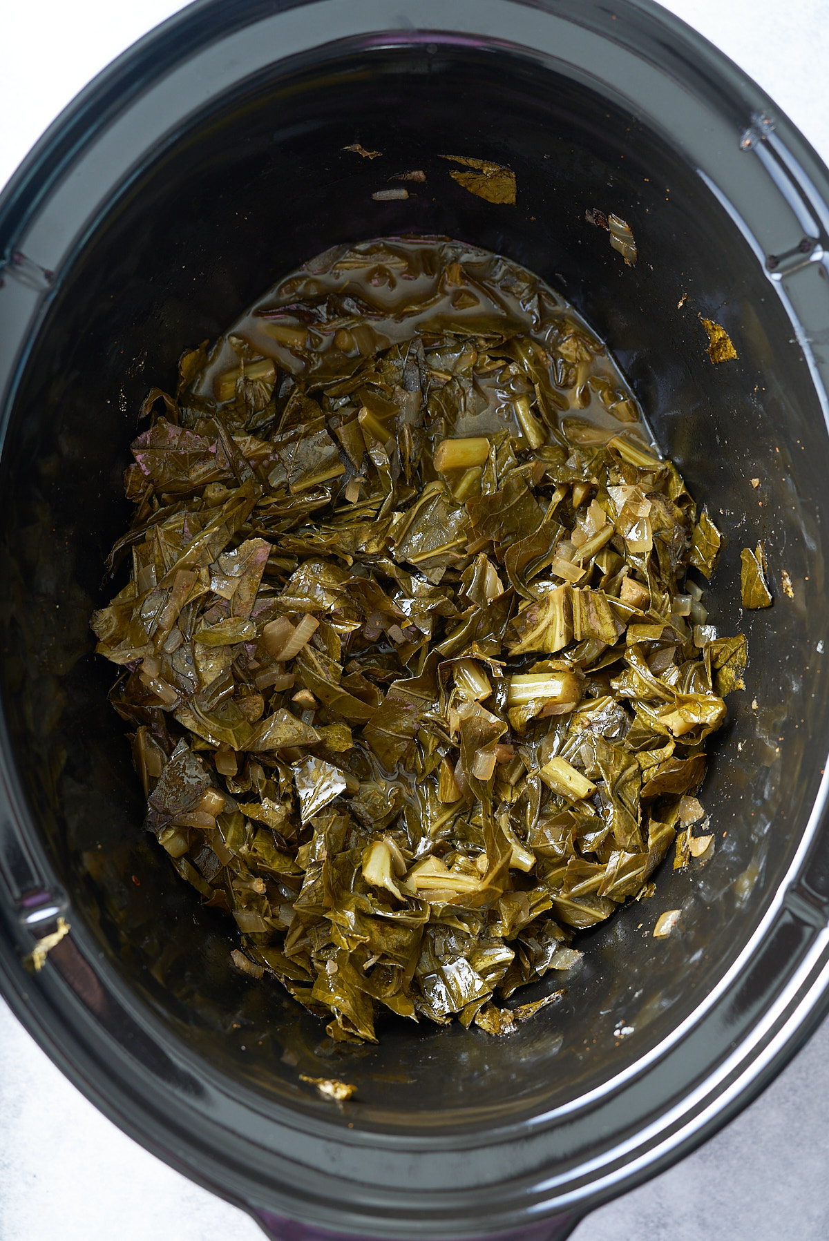 collard green in black slow cooker