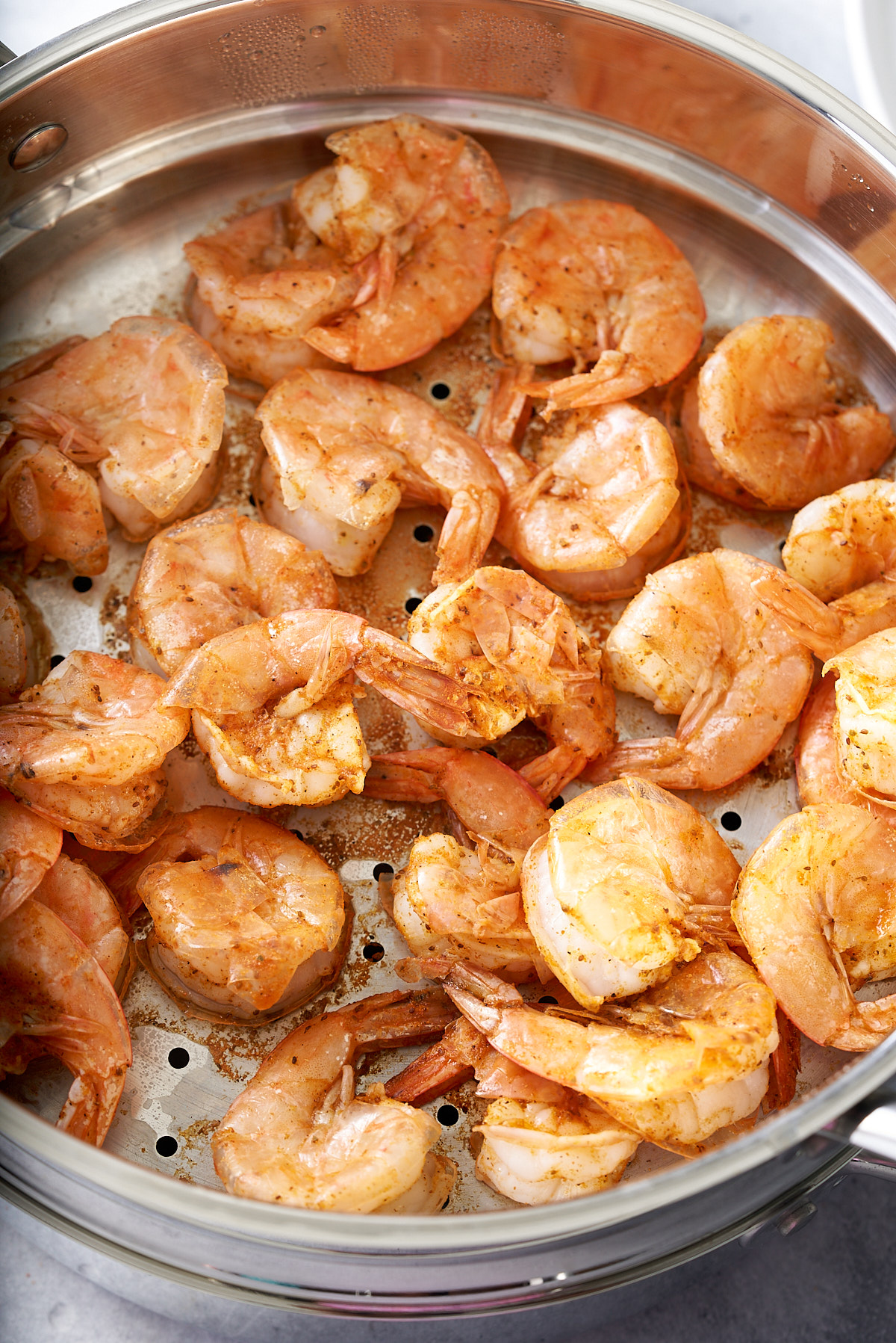 cooked shrimp in steamer basket