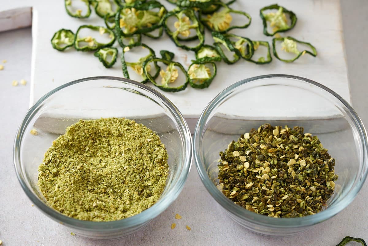 Dried jalapenos diced in a bowl and made into a powder.