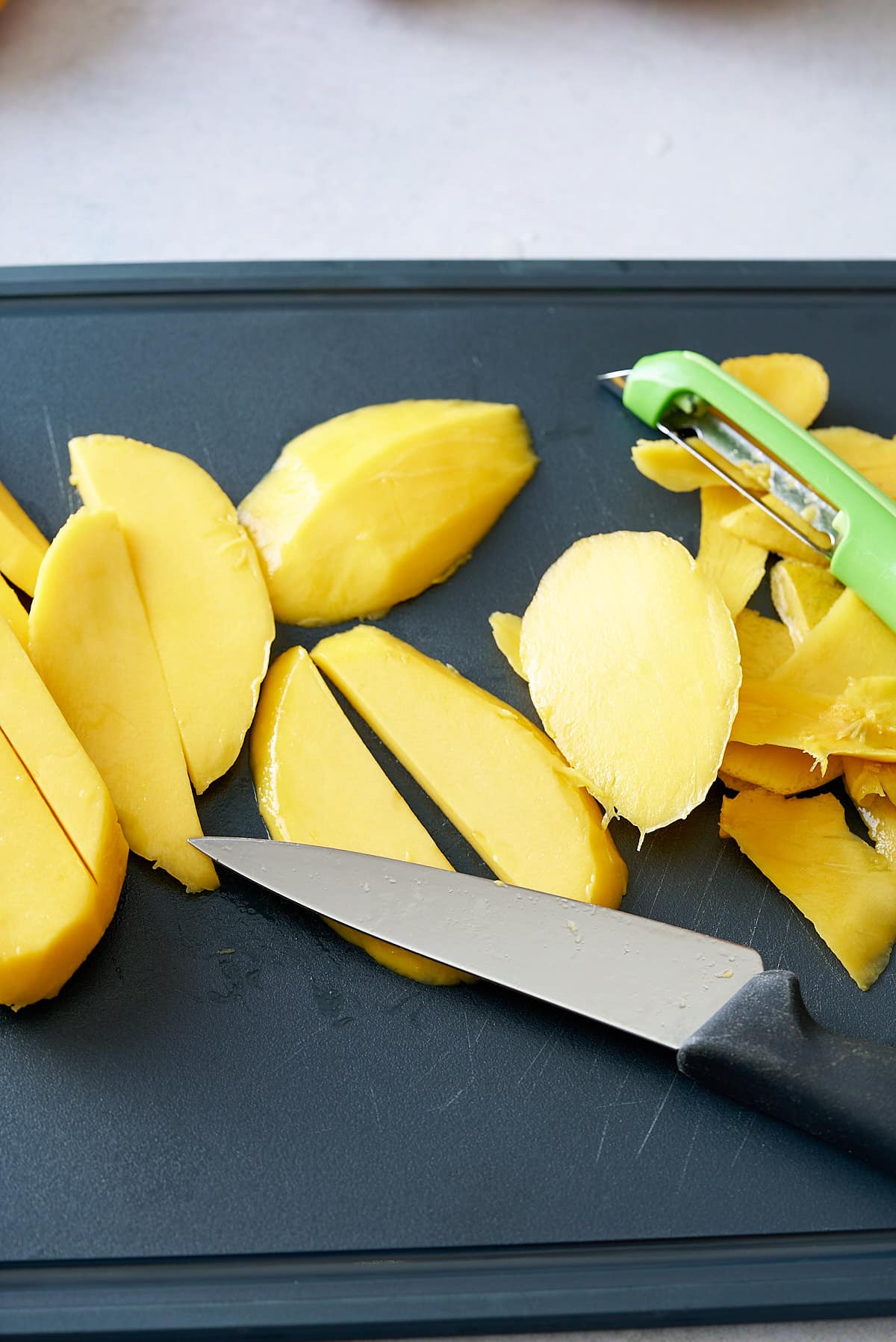 slices of mango cut in half