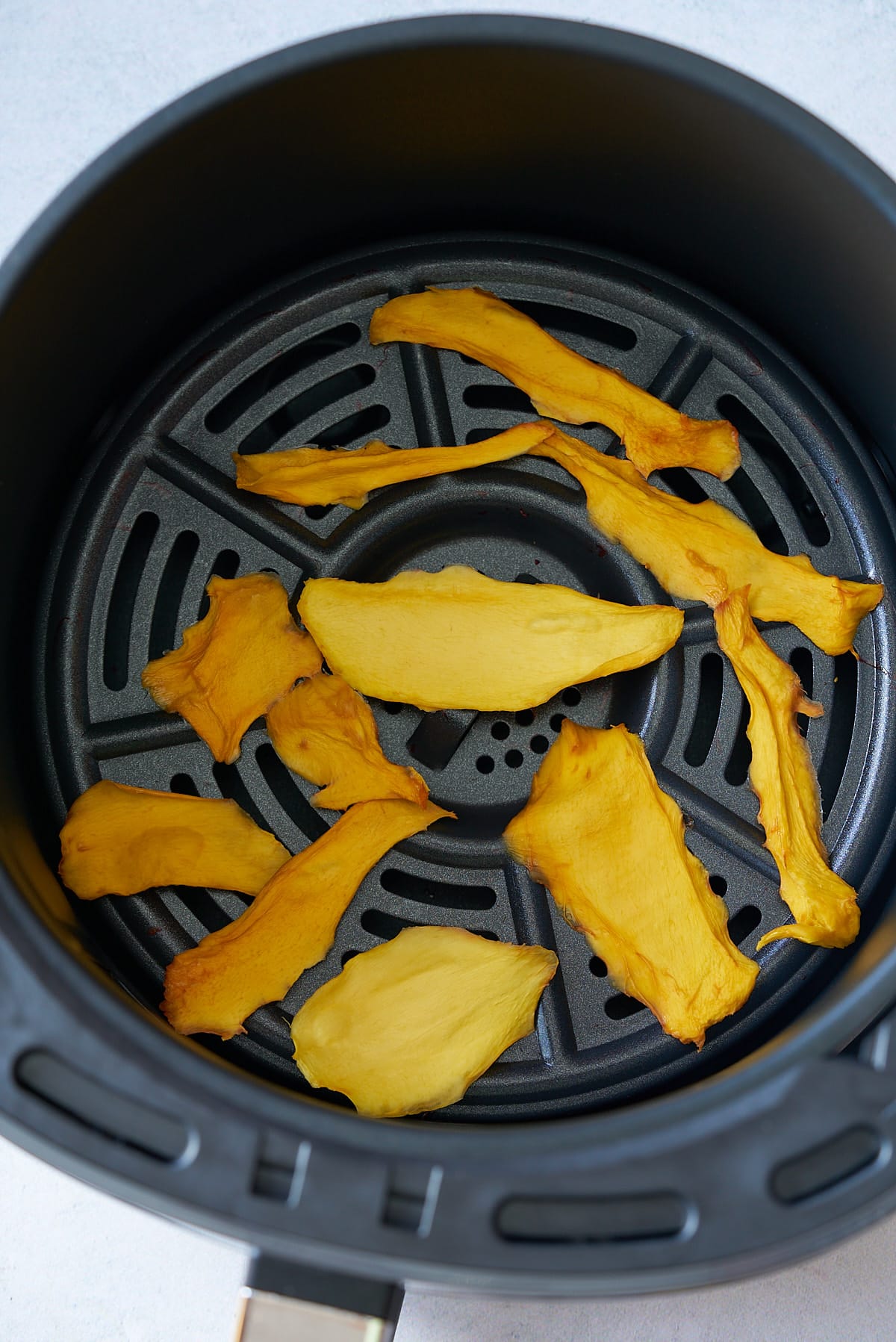 dehydrated mango in air fryer basket