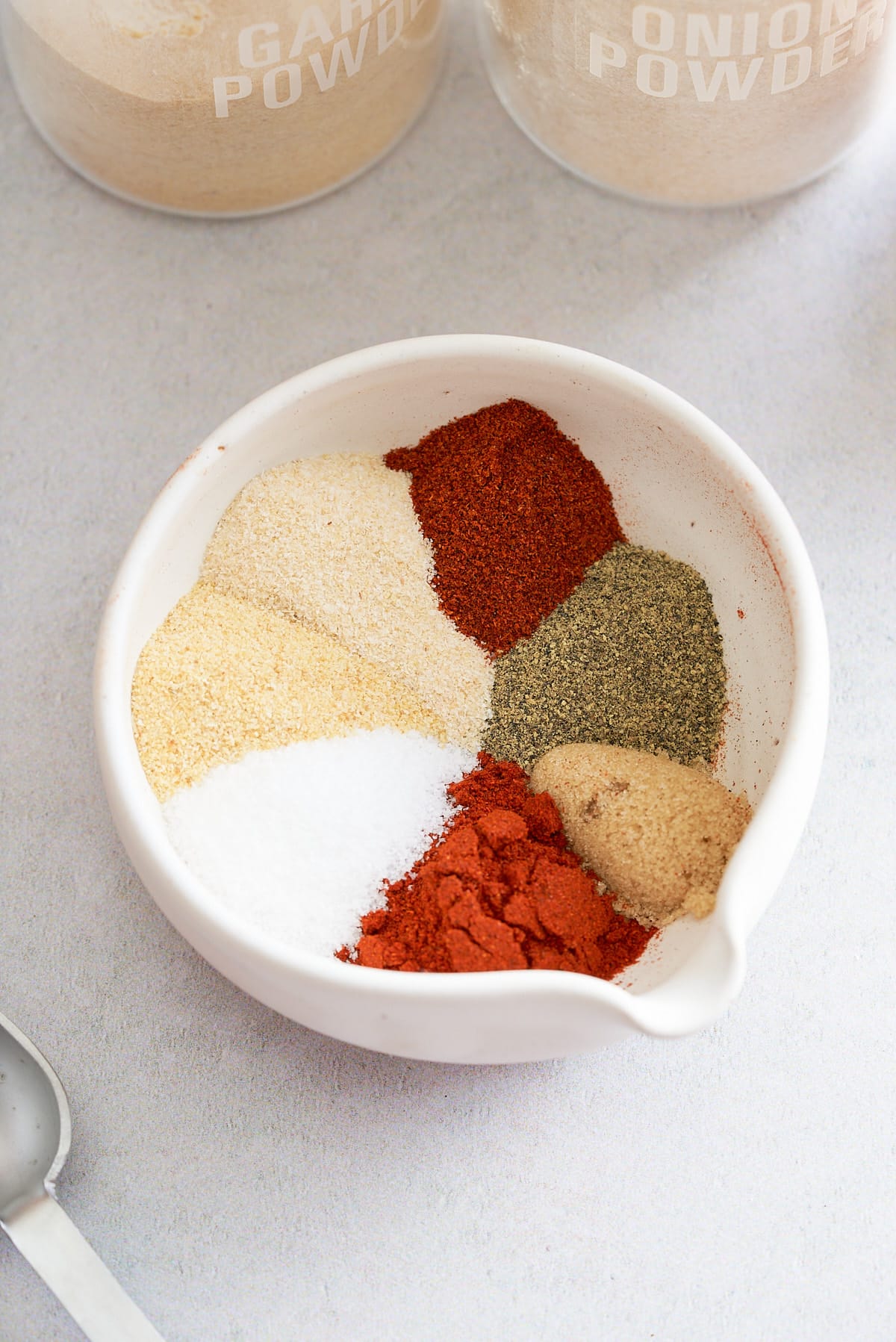 hamburger seasoning ingredients in a bowl before being mixed.