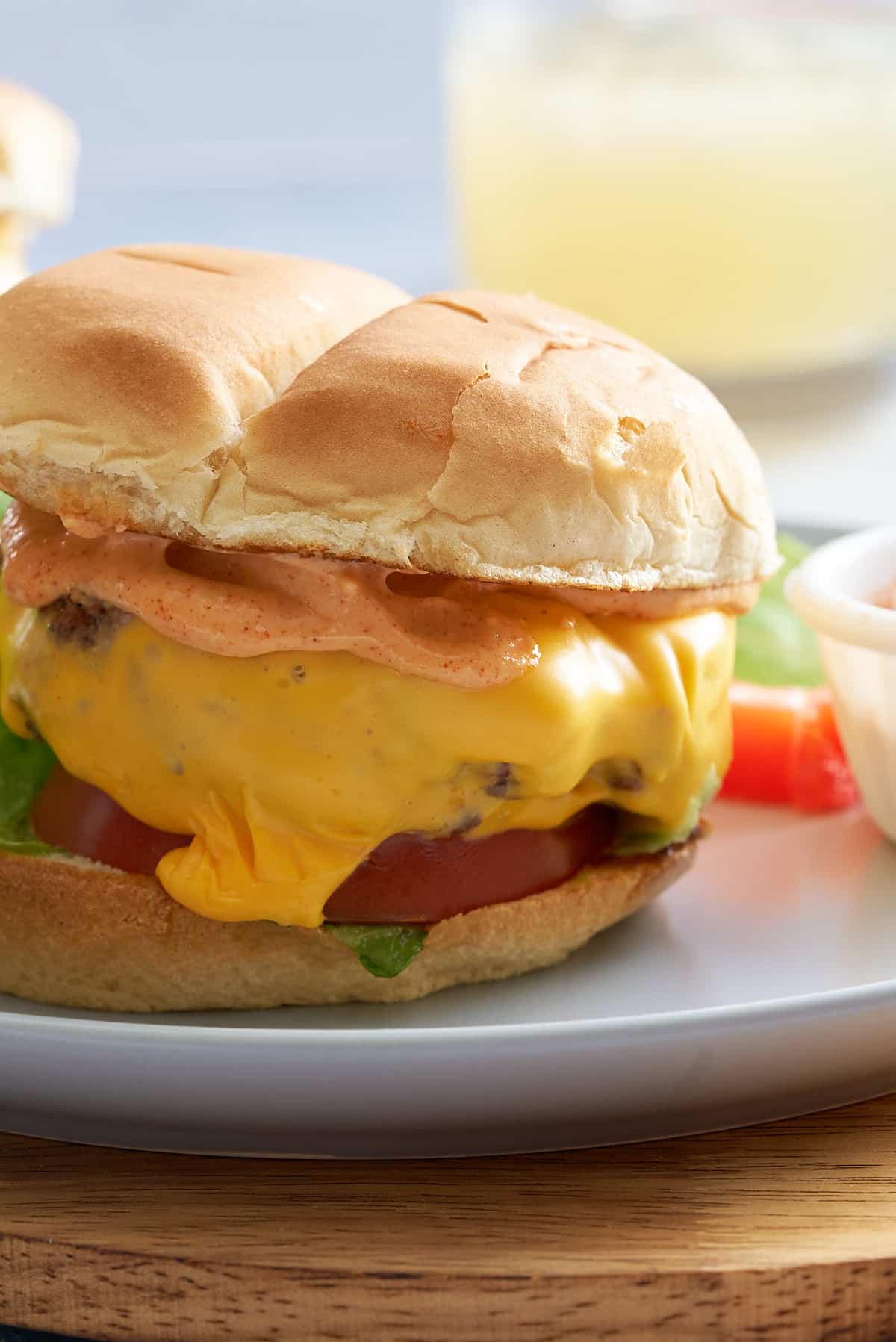 Close up of a prepared steamed cheeseburger with all of the toppings.