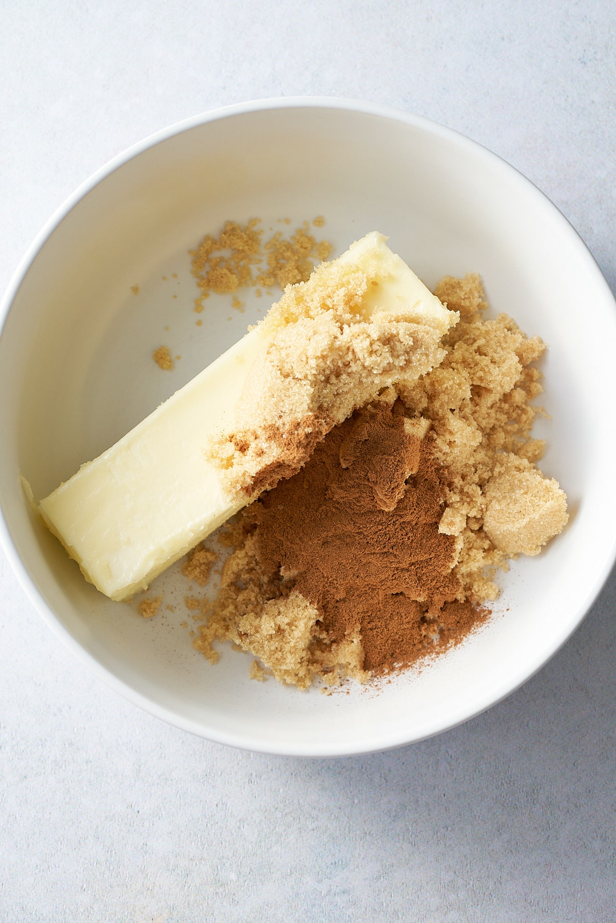Ingredients added to a mixing bowl together.