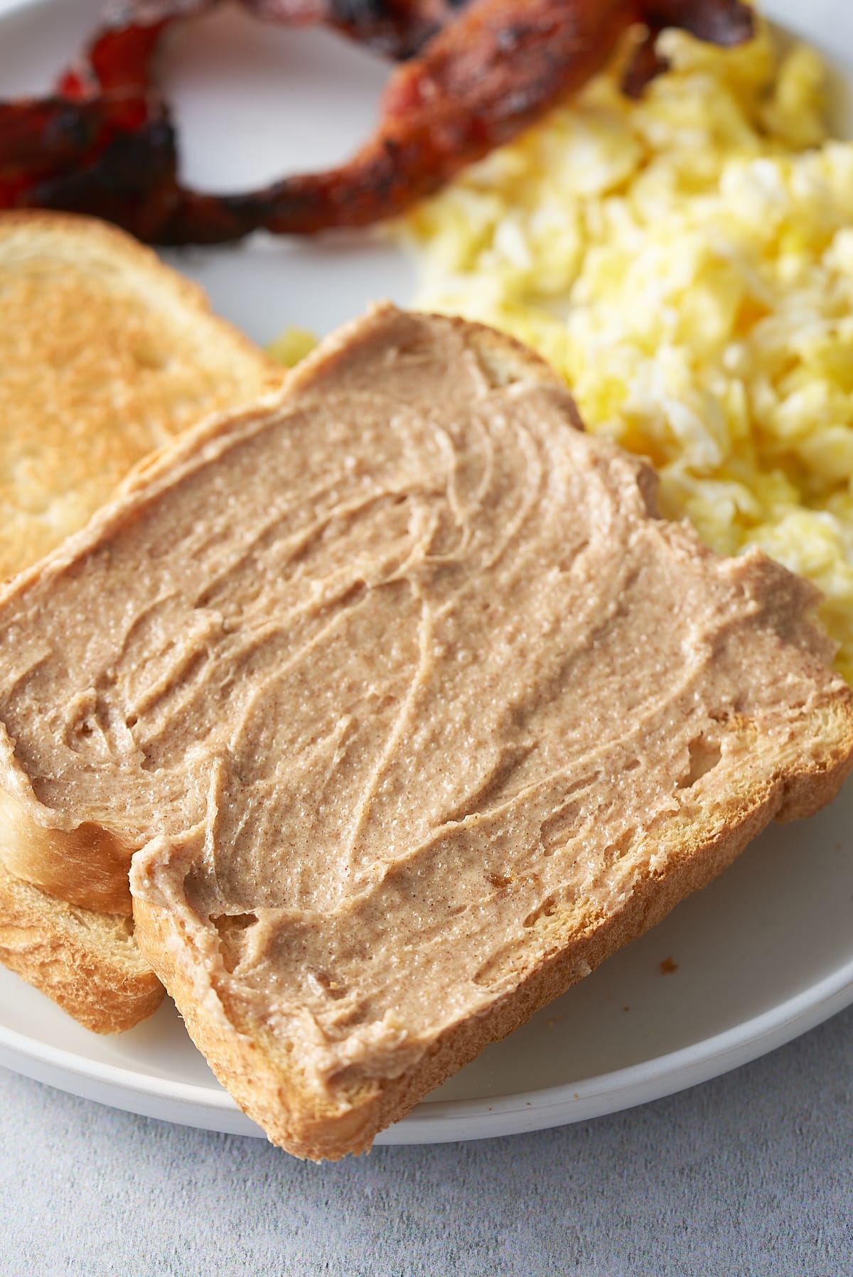 Cinnamon butter smeared on toast.
