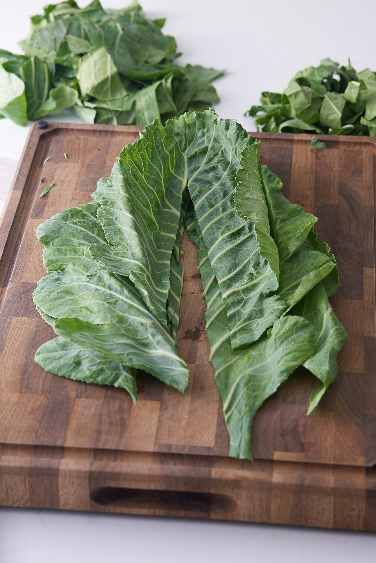 collard greens stacked on top of each other
