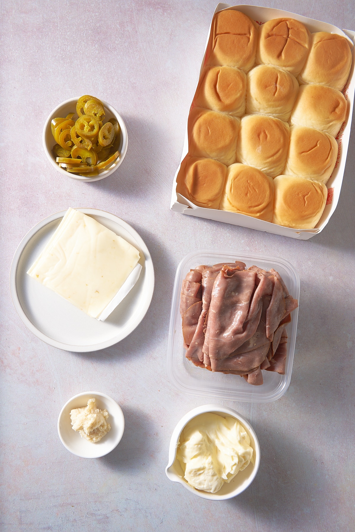 Roast beef sliders recipe ingredients set into individual dishes.
