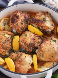 braised chicken thighs in white braising pan