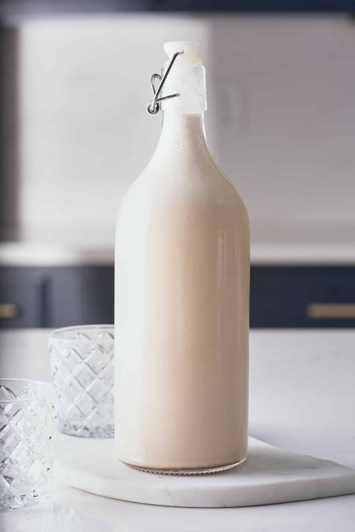 a bottle of coquito with a sealed lid