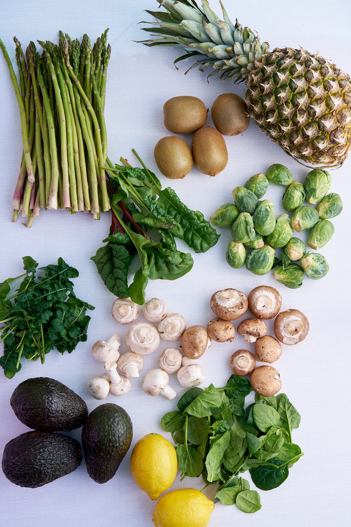 fruits and vegetables on white table