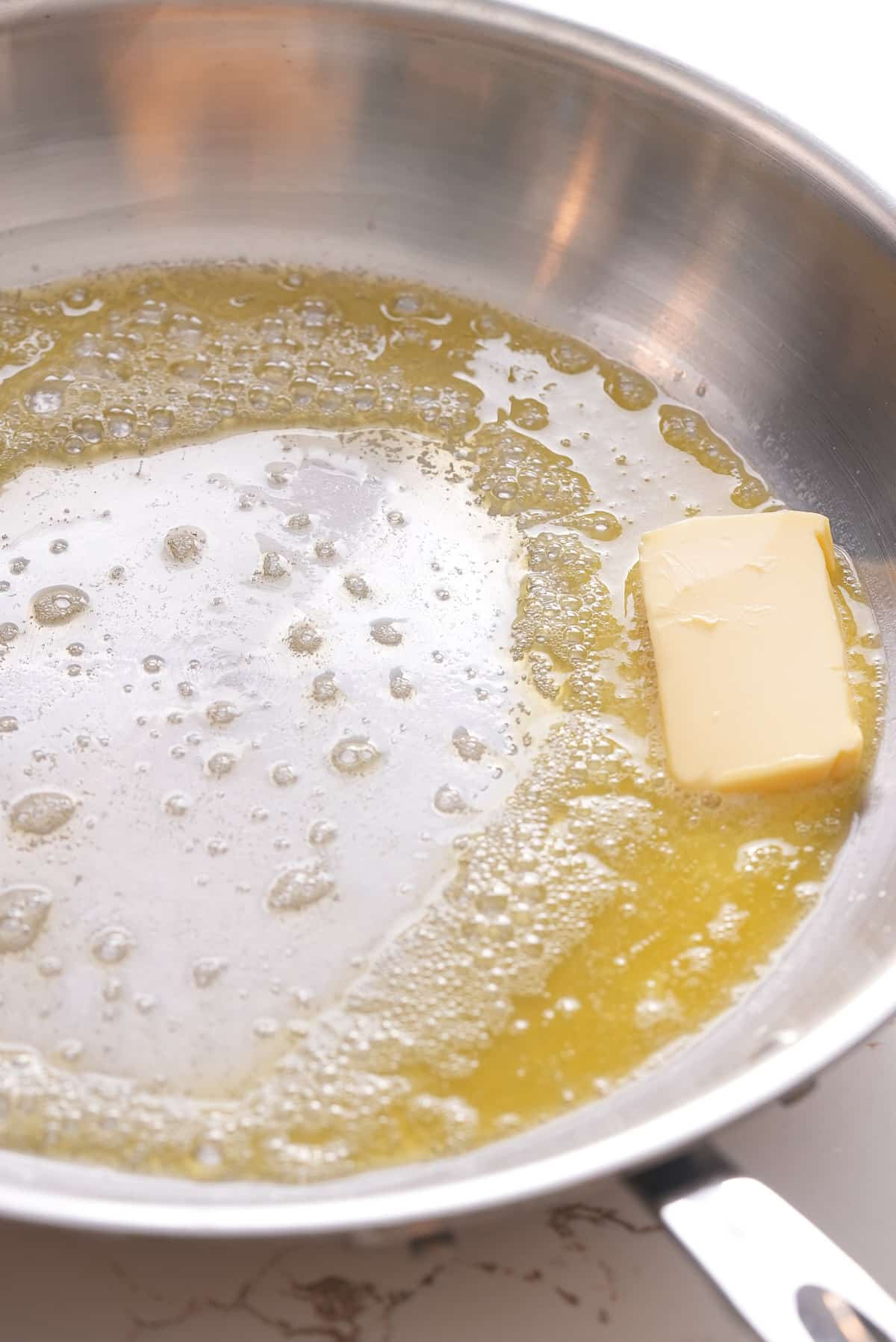 melting butter in a skillet.