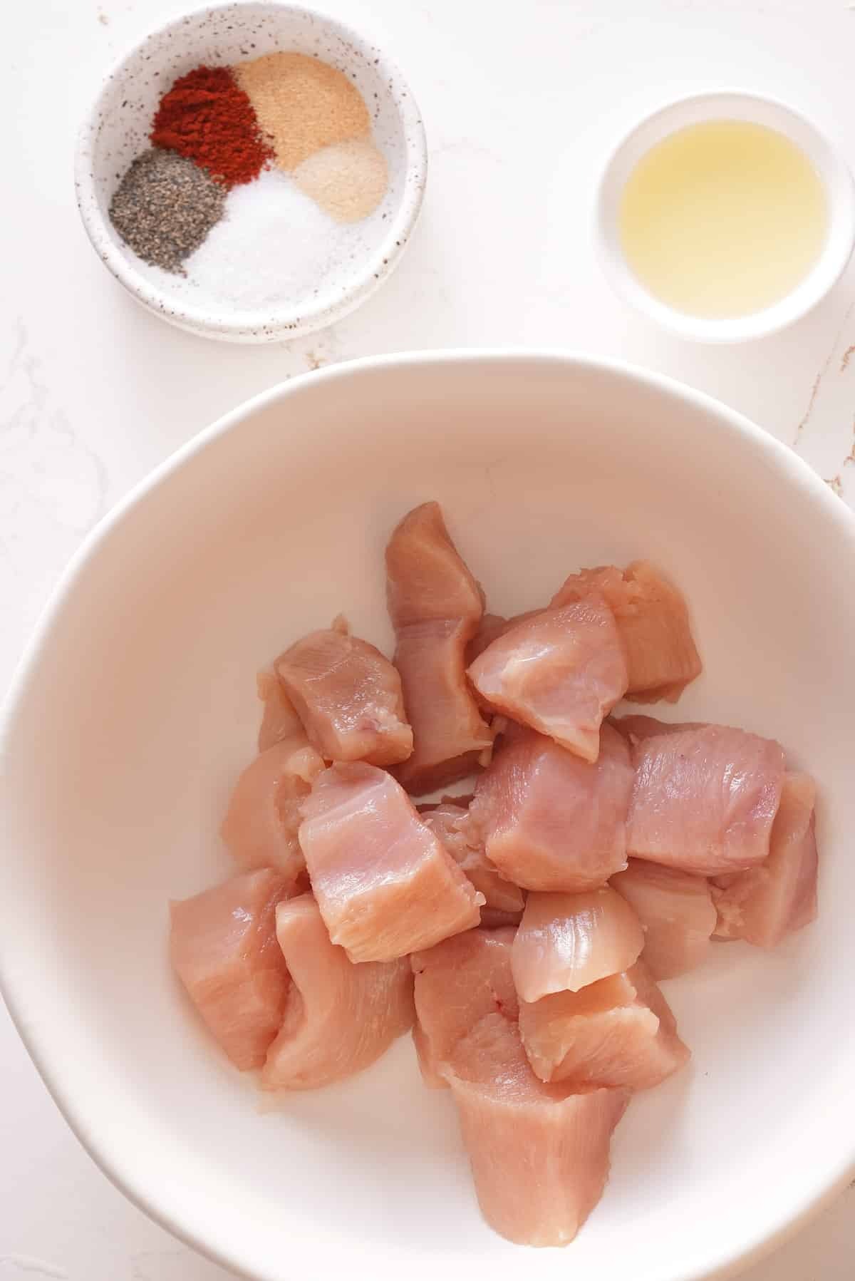 Air fryer recipe ingredients set into individual bowls.