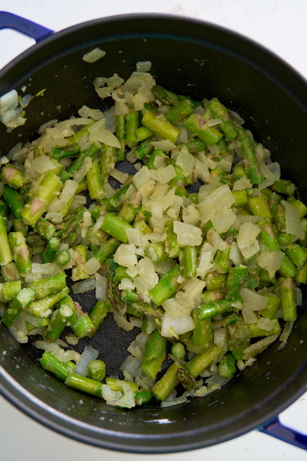 asparagus tips and onions cooking in flour and butter