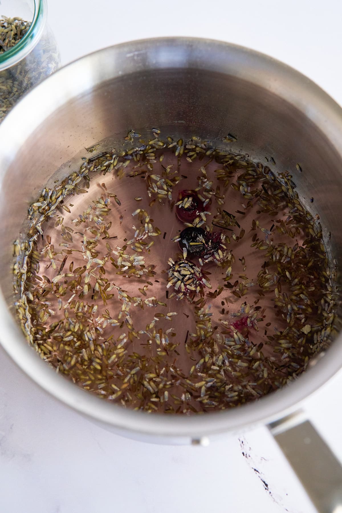 lavender simple syrup in put after simmering