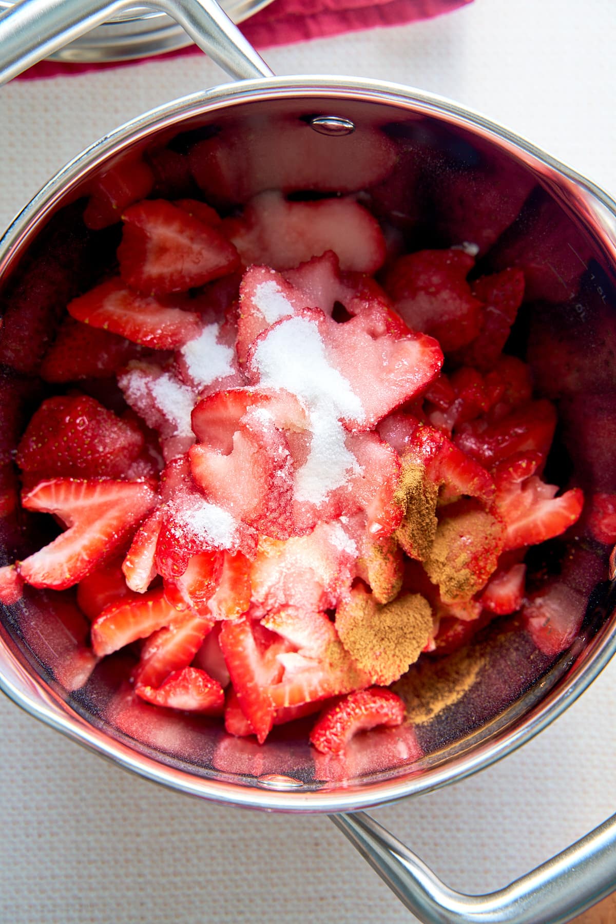 ingredients for compote in a saucepan before simmering