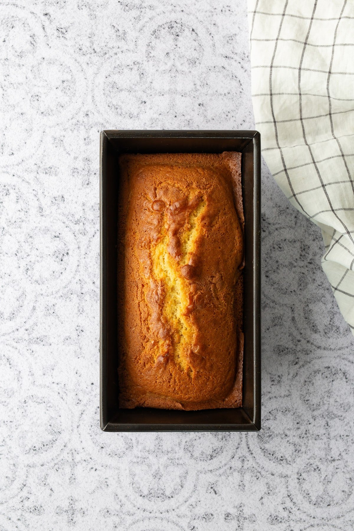 freshly baked grapefruit cake in pan