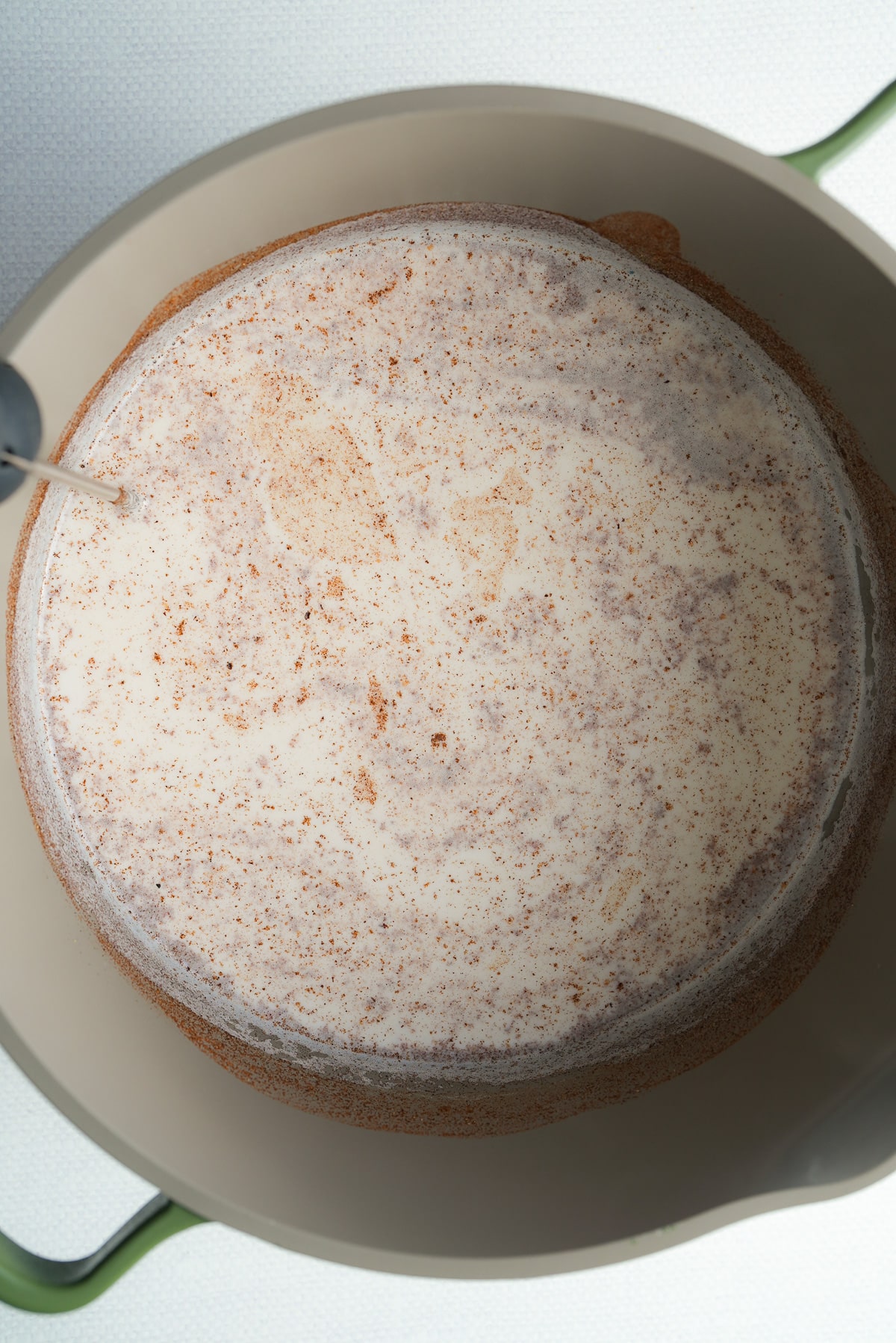 milk and spices in pot simmering in pot