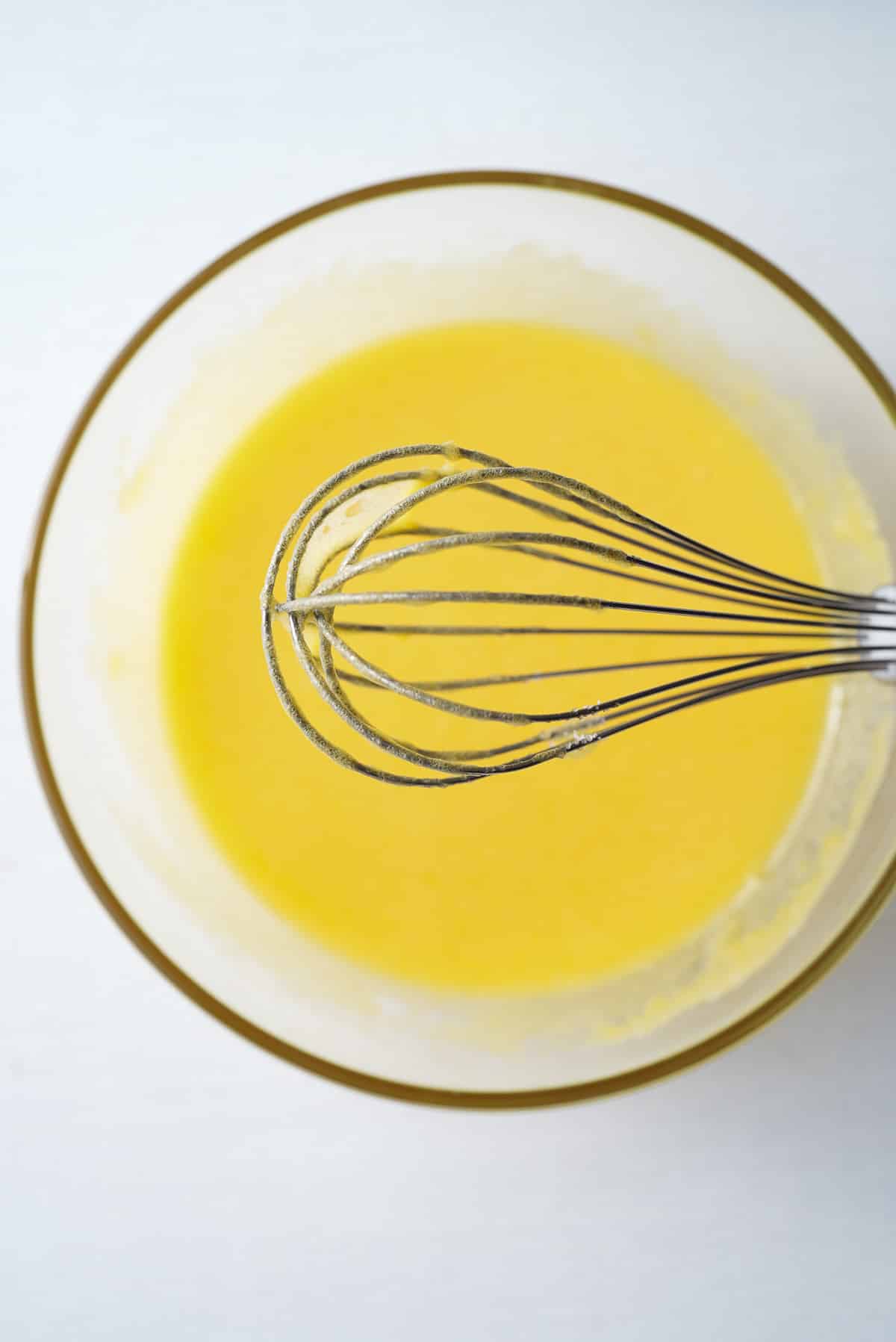 egg yolks whisked with sugar in bowl