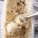 rum raisin ice cream being scooped with ice cream scoop