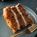slice of carrot cake with fork on side