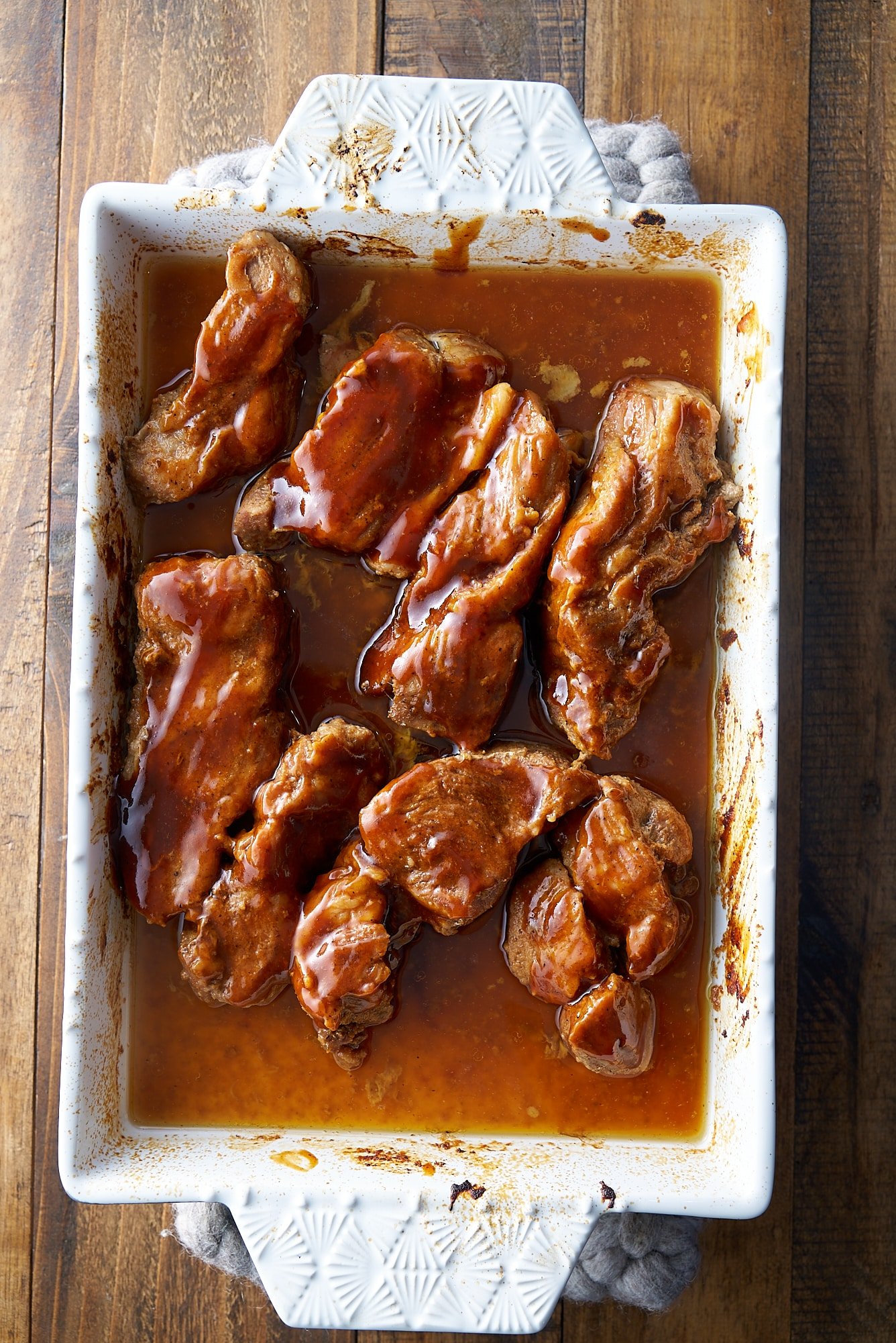 country style ribs with fresh bbq sauce on it