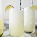 limemade in a glass with straw in it