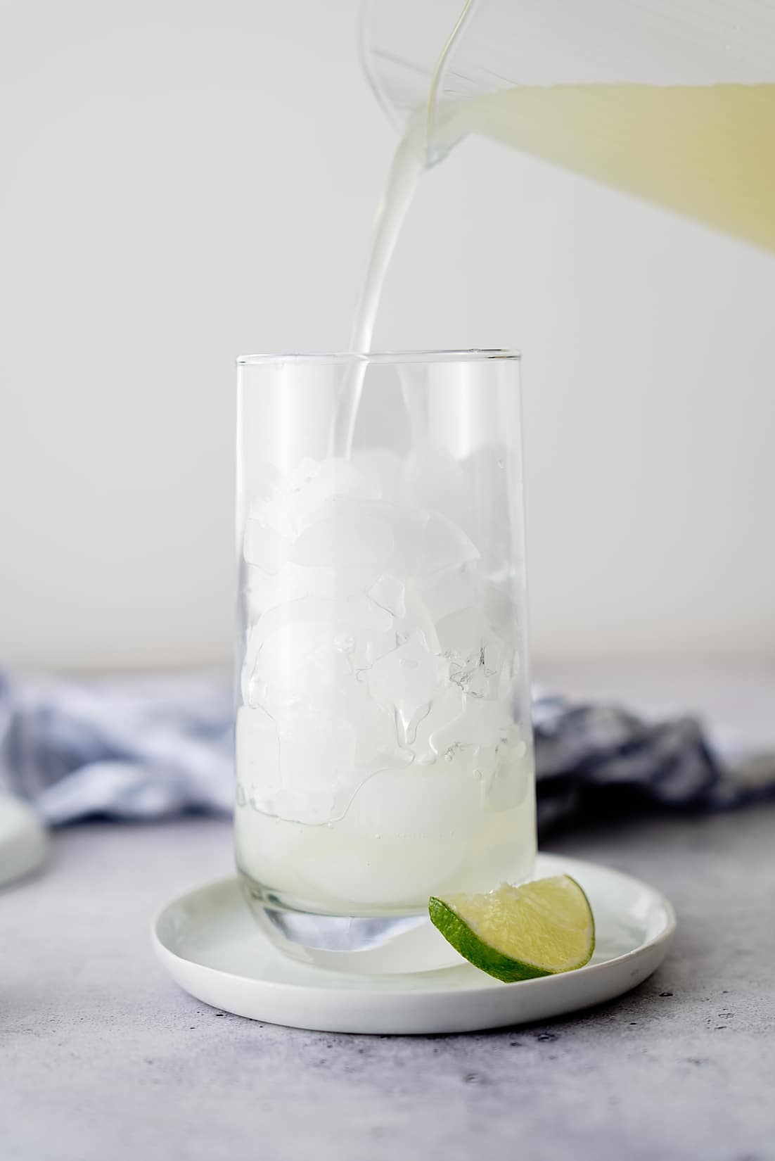 limeade being poured into a glass
