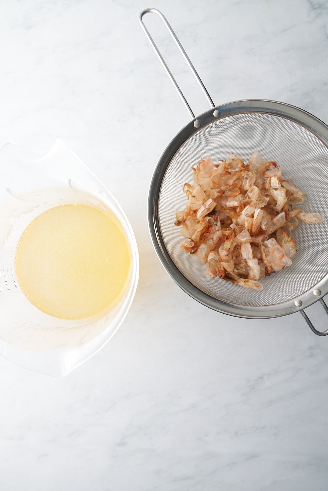drained stock with shrimp shells on side