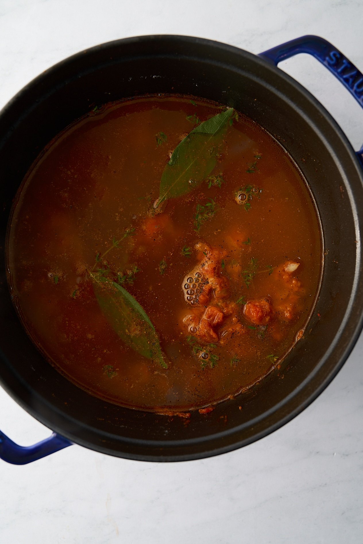 shrimp bisque broth ingredients in pot