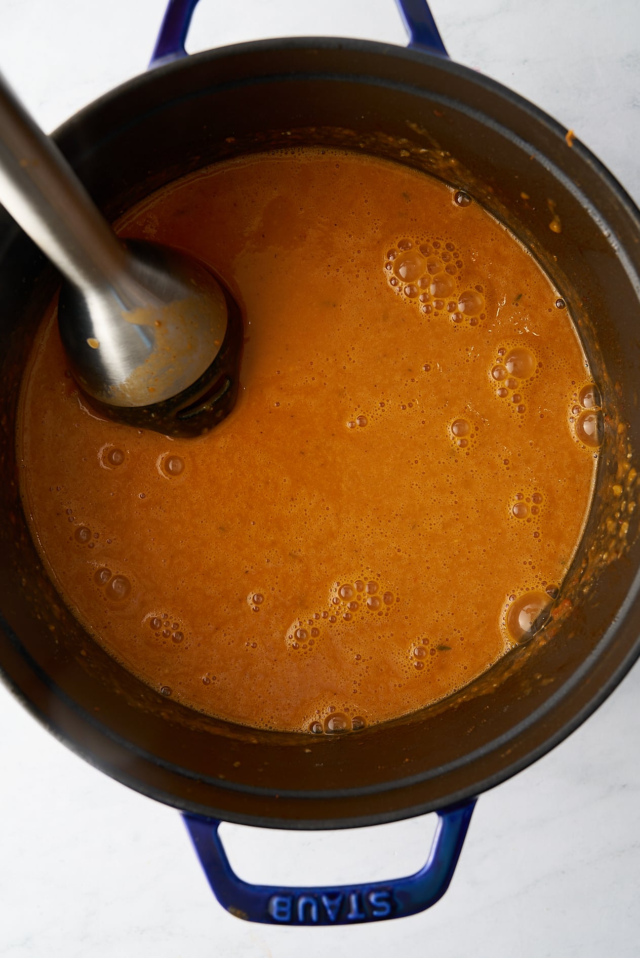 immersion blender in pot of soup