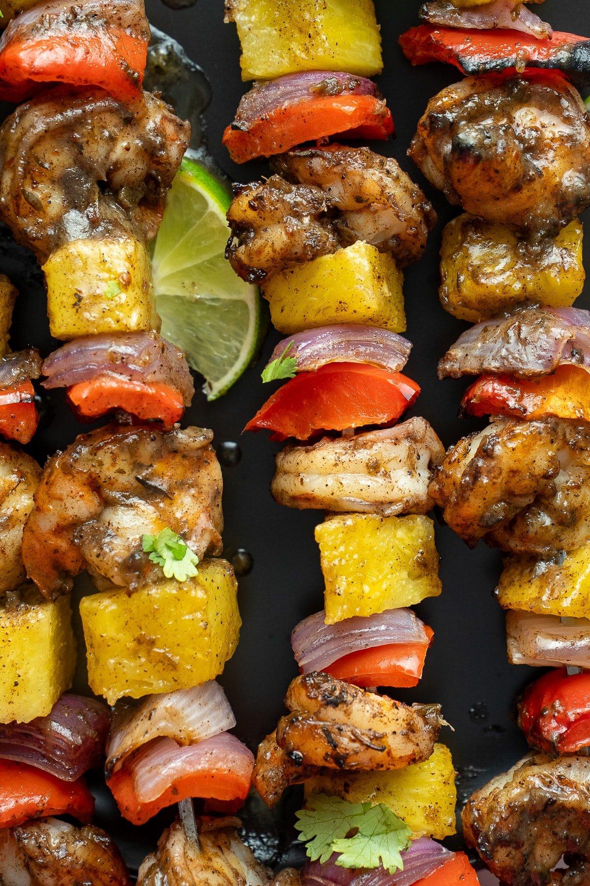 close up photo of jerk skewers